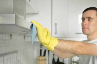 cleaning with rubber gloves